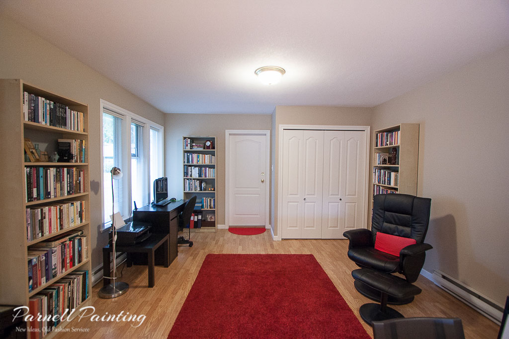 den painted brown with white trim