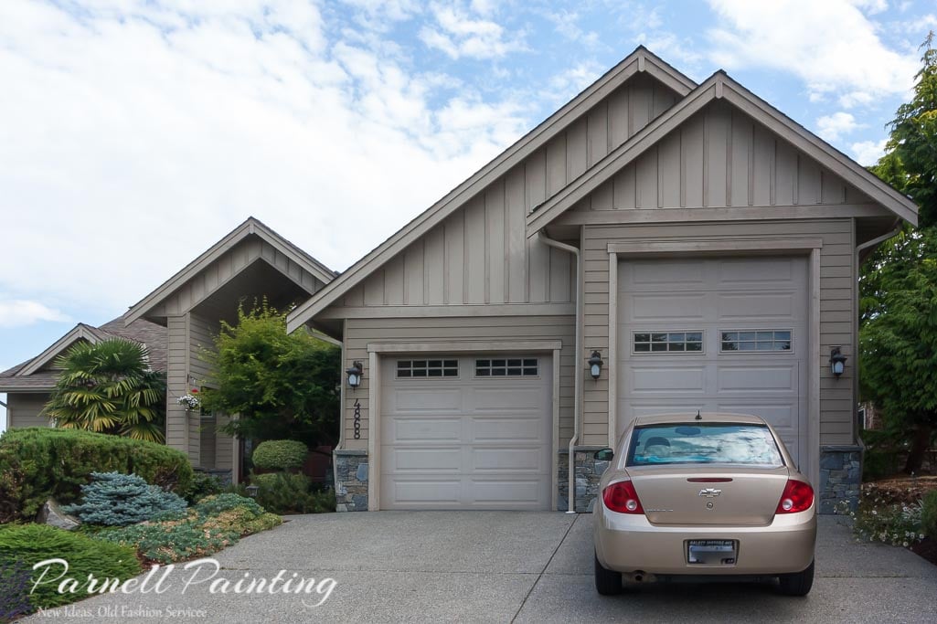 Before exterior painting of large Nanaimo house that has is faded and has little contrast between the body and trim colour